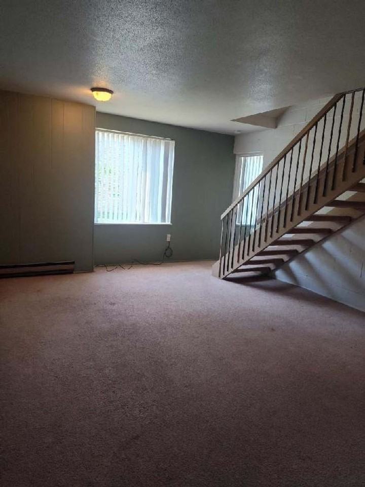 THE QUADS APARTMENTS - Photo 7 of 16