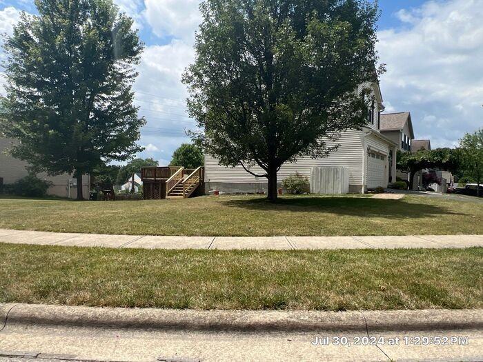 5661 Winsor Woods Dr - Photo 2 of 23