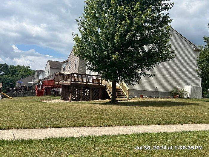 5661 Winsor Woods Dr - Photo 3 of 23