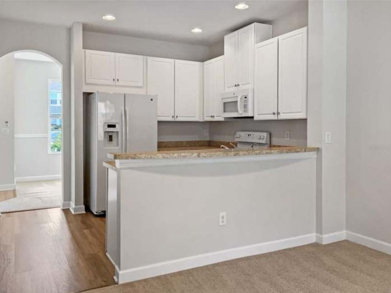 7028 White Treetop Pl - Photo 5 of 16