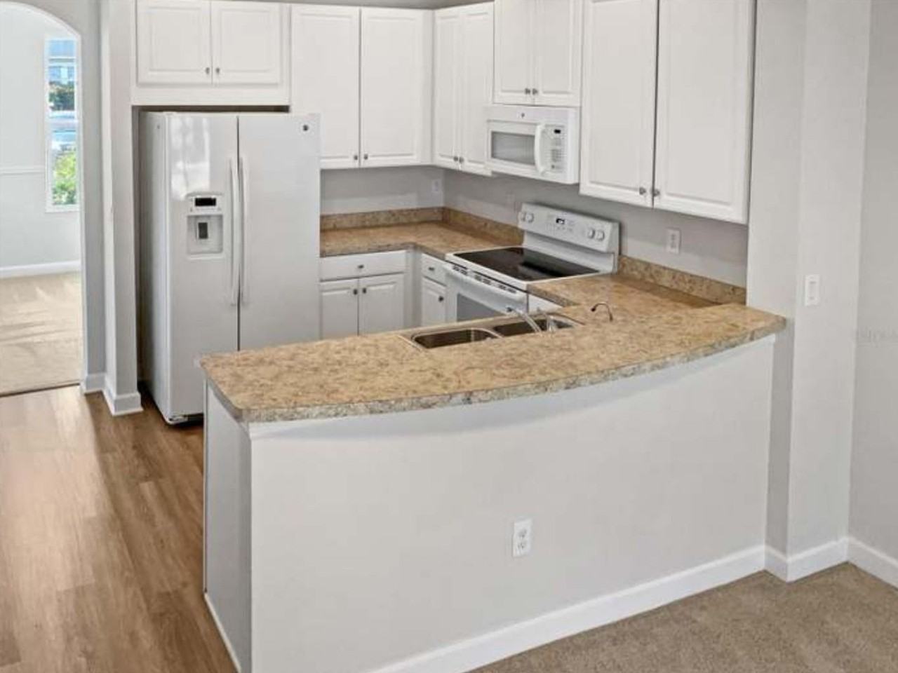 7028 White Treetop Pl - Photo 6 of 16
