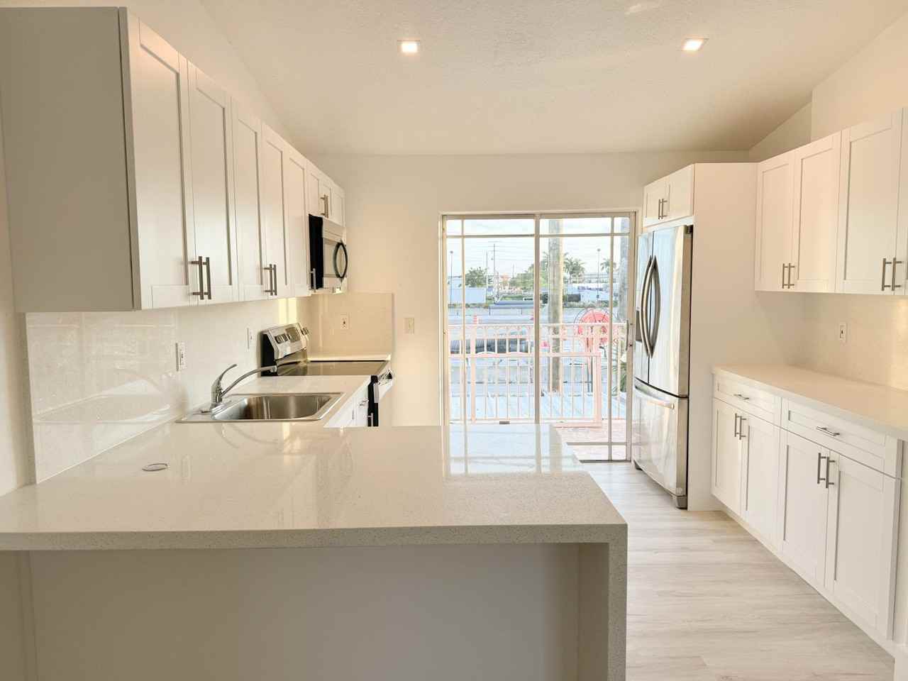 10903 W Okeechobee Rd #202 - Photo 2 of 15