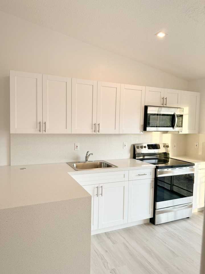10903 W Okeechobee Rd #202 - Photo 3 of 15