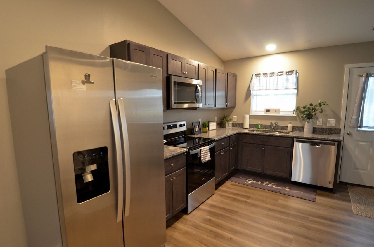 Ground level two bedroom units with private parking AND private laundry! - Photo 6 of 12