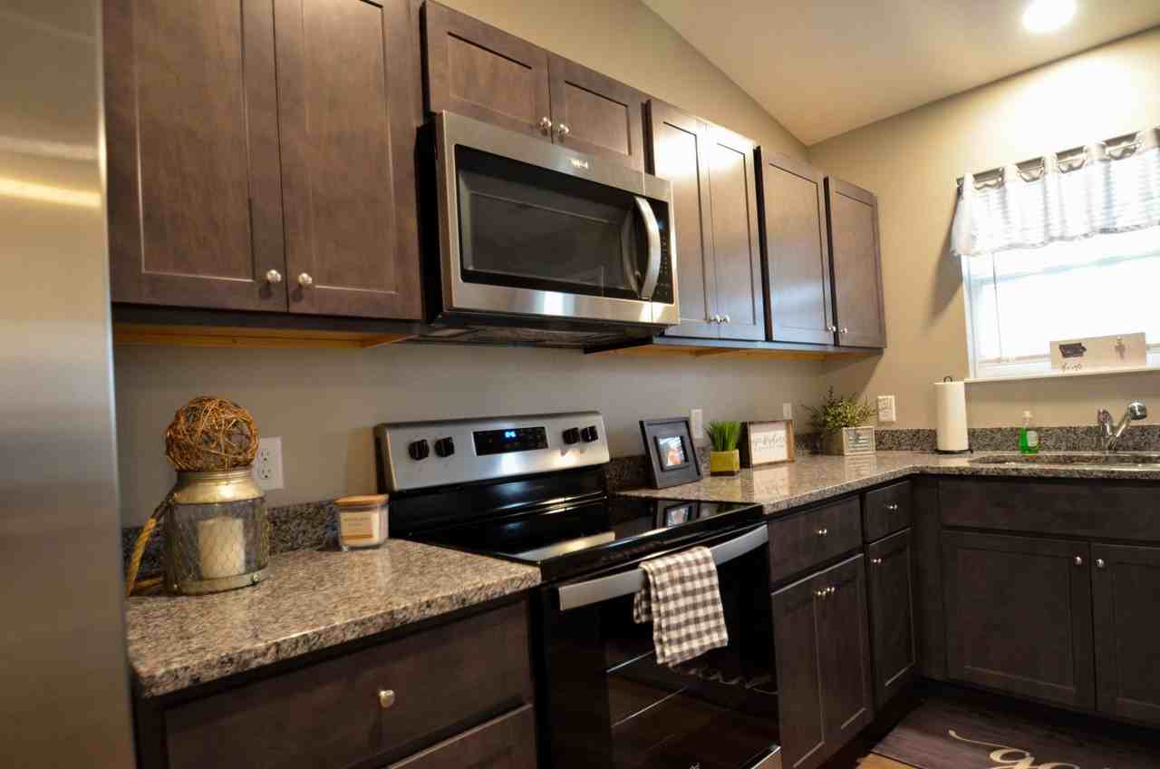 Ground level two bedroom units with private parking AND private laundry! - Photo 7 of 12