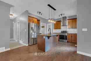 6949 Evans Wynd Nw #1 - Photo 1 of 1