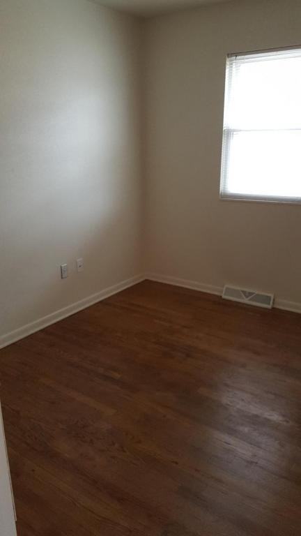 209 E 2nd St - Photo 3 of 8