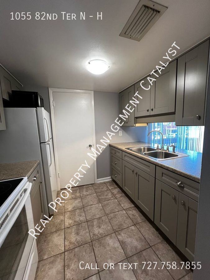 1055 82nd Ter N #H - Photo 2 of 17