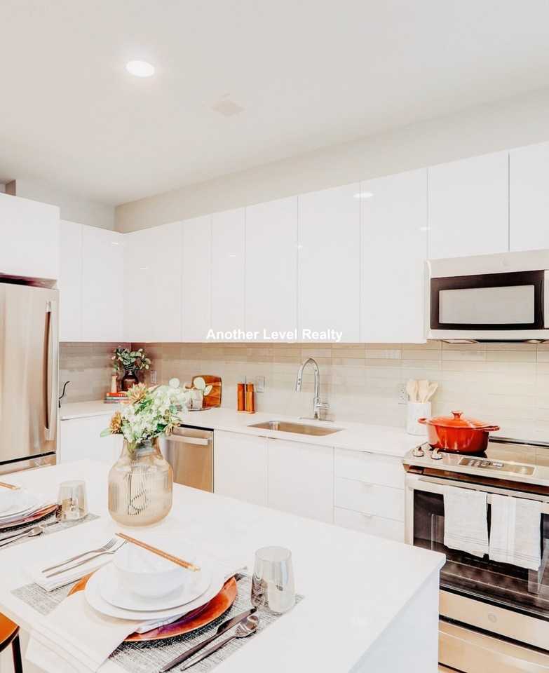 Sydney St #221 - Photo 3 of 9