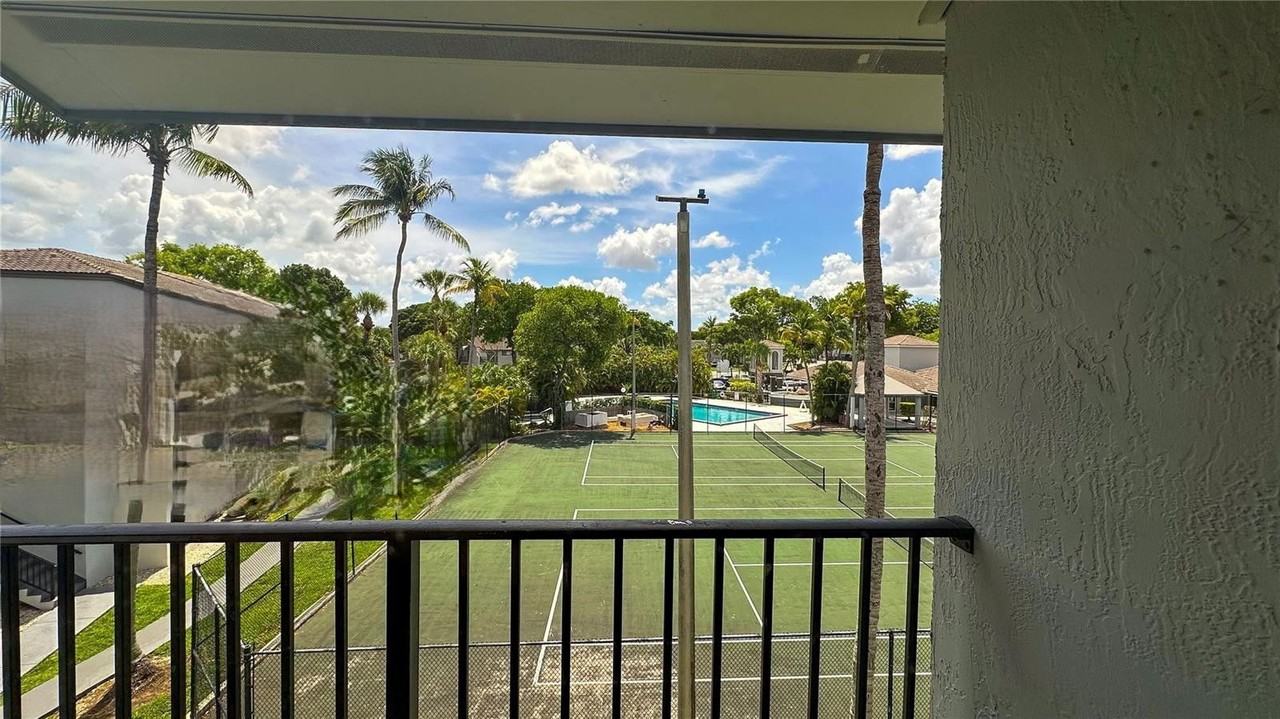 7090 Nw 179th St #309 - Photo 2 of 8