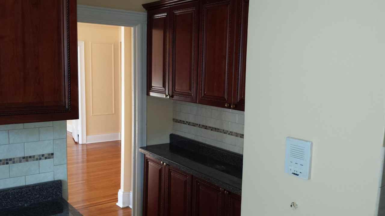 715 Ave C - Photo 2 of 9