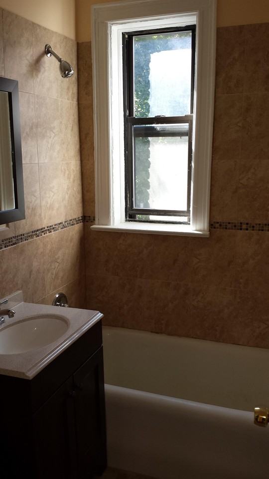 715 Ave C - Photo 3 of 9