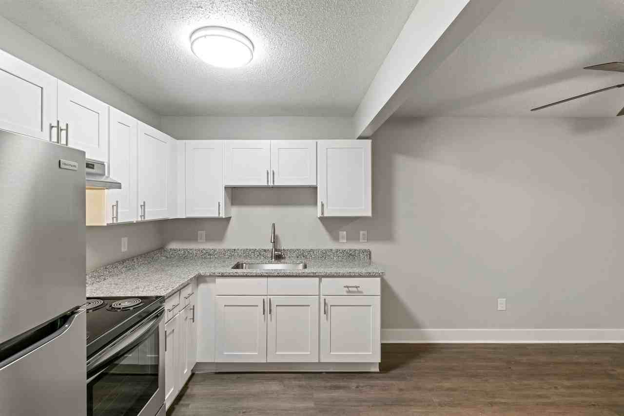 Center Court Apartments - Photo 5 of 44