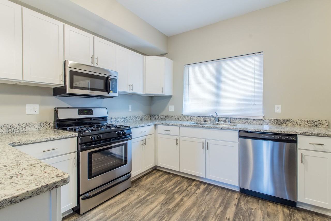 Waterford Townhomes LLC - Photo 3 of 15