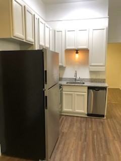 PUJO ST APARTMENTS - Photo 3 of 7