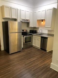 PUJO ST APARTMENTS - Photo 4 of 7