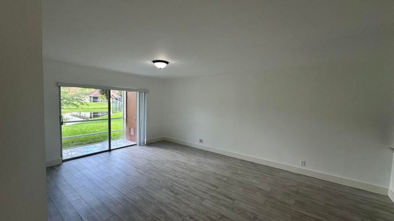 9991 Three Lakes Cir #25C - Photo 2 of 13