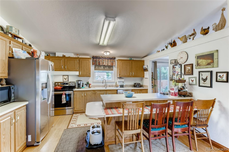 9040 W 64th Pl - Photo 2 of 19