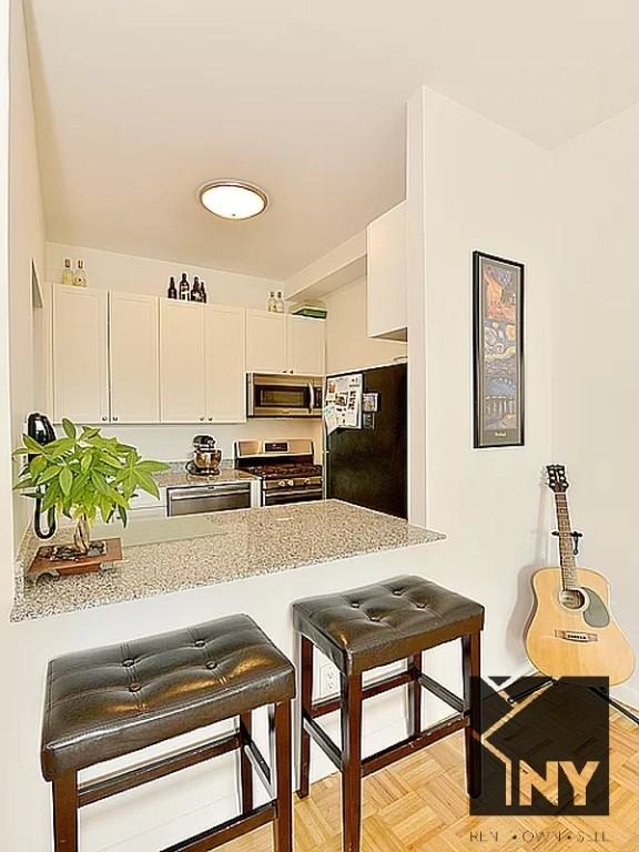 Wall St #2102 - Photo 4 of 5