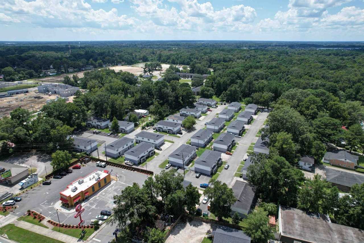 Tristan Townhomes - Photo 2 of 16