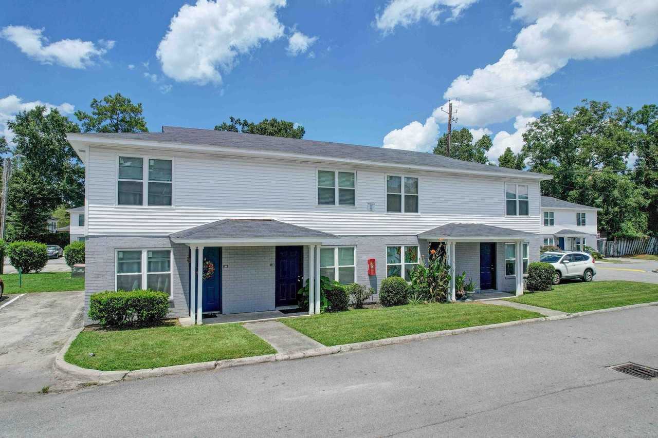 Tristan Townhomes - Photo 3 of 16