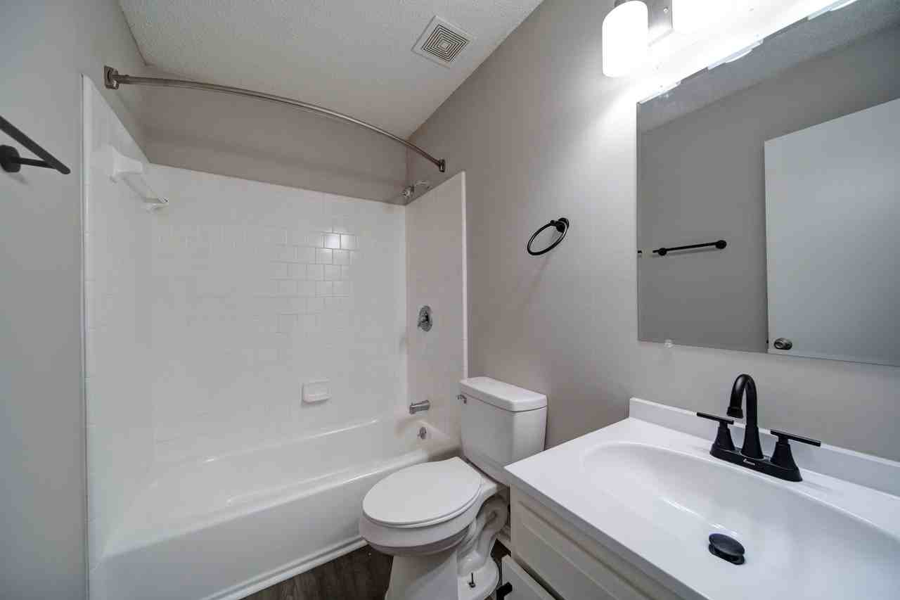 Tristan Townhomes - Photo 4 of 16