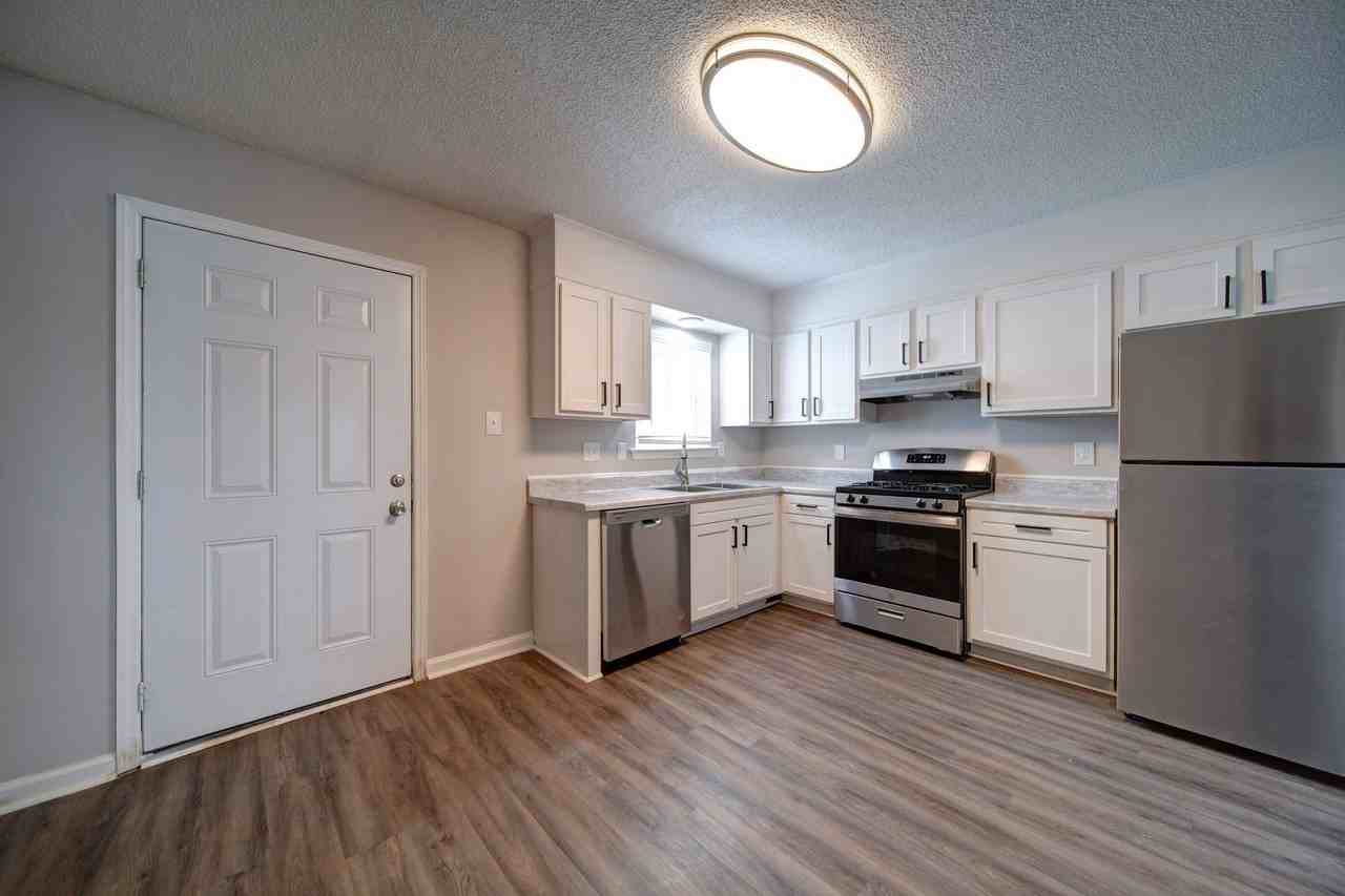 Tristan Townhomes - Photo 5 of 16