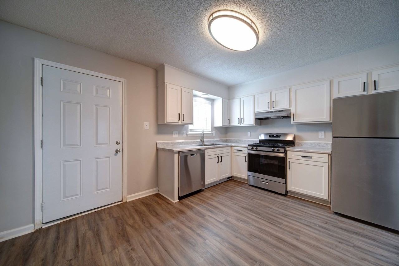 Tristan Townhomes - Photo 6 of 16