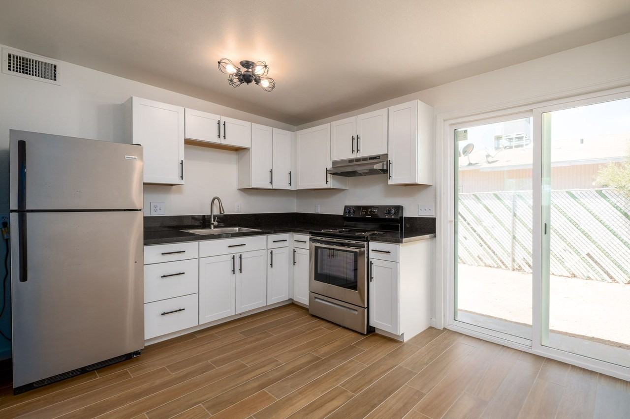 North Central (Stone and Limberlost), 2 bedroom, 1 bath duplexes, large fenced yards with a/c! - Photo 3 of 18