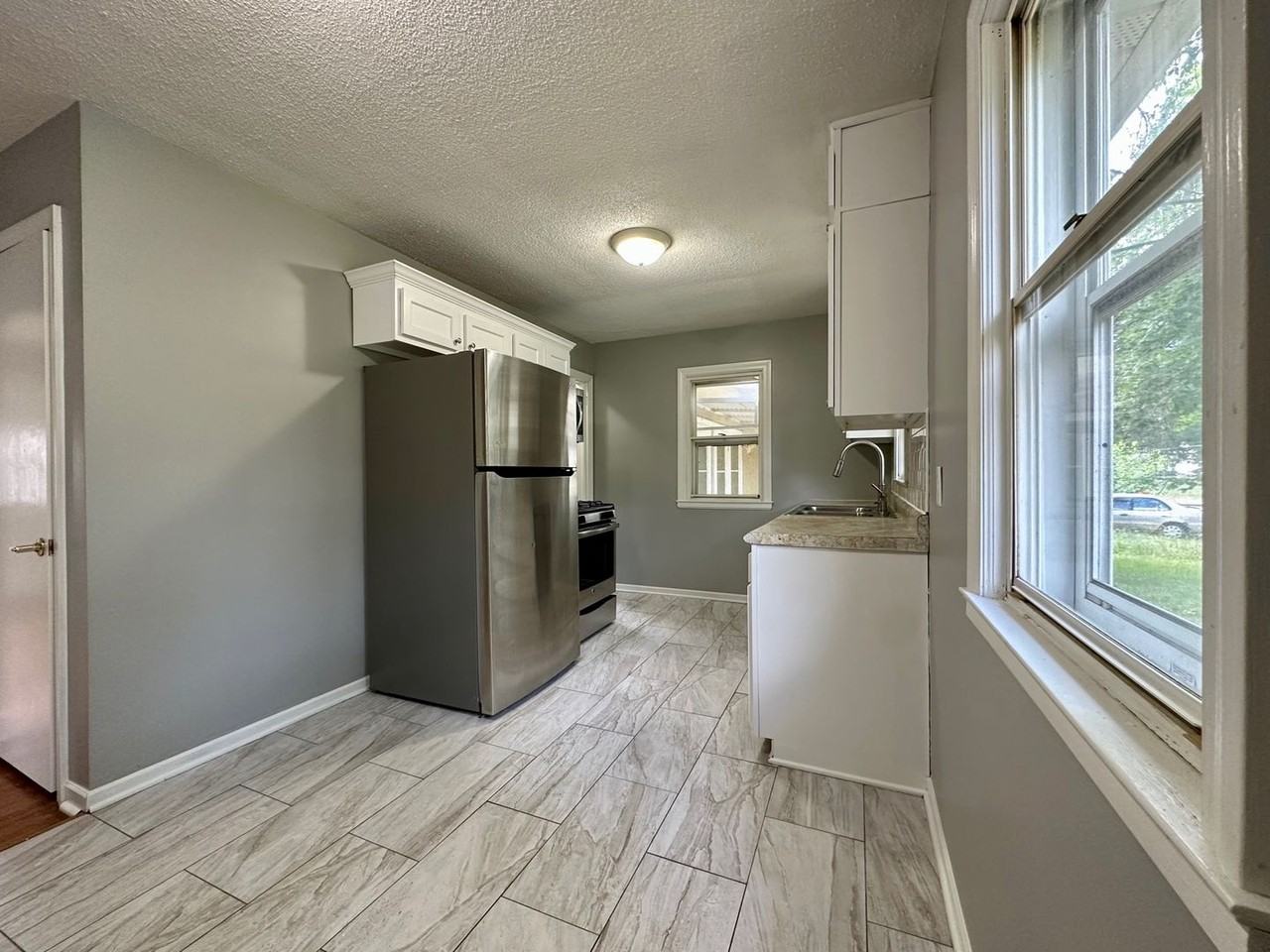 6009 Aldrich Ave N - Photo 2 of 6