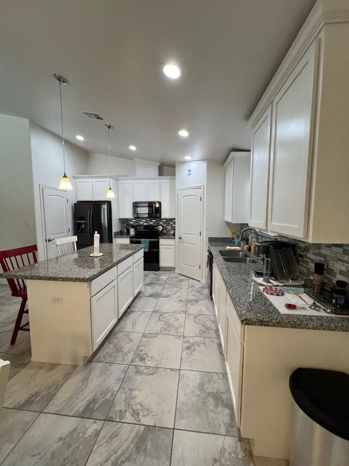 12625 E 48th Dr - Photo 7 of 29