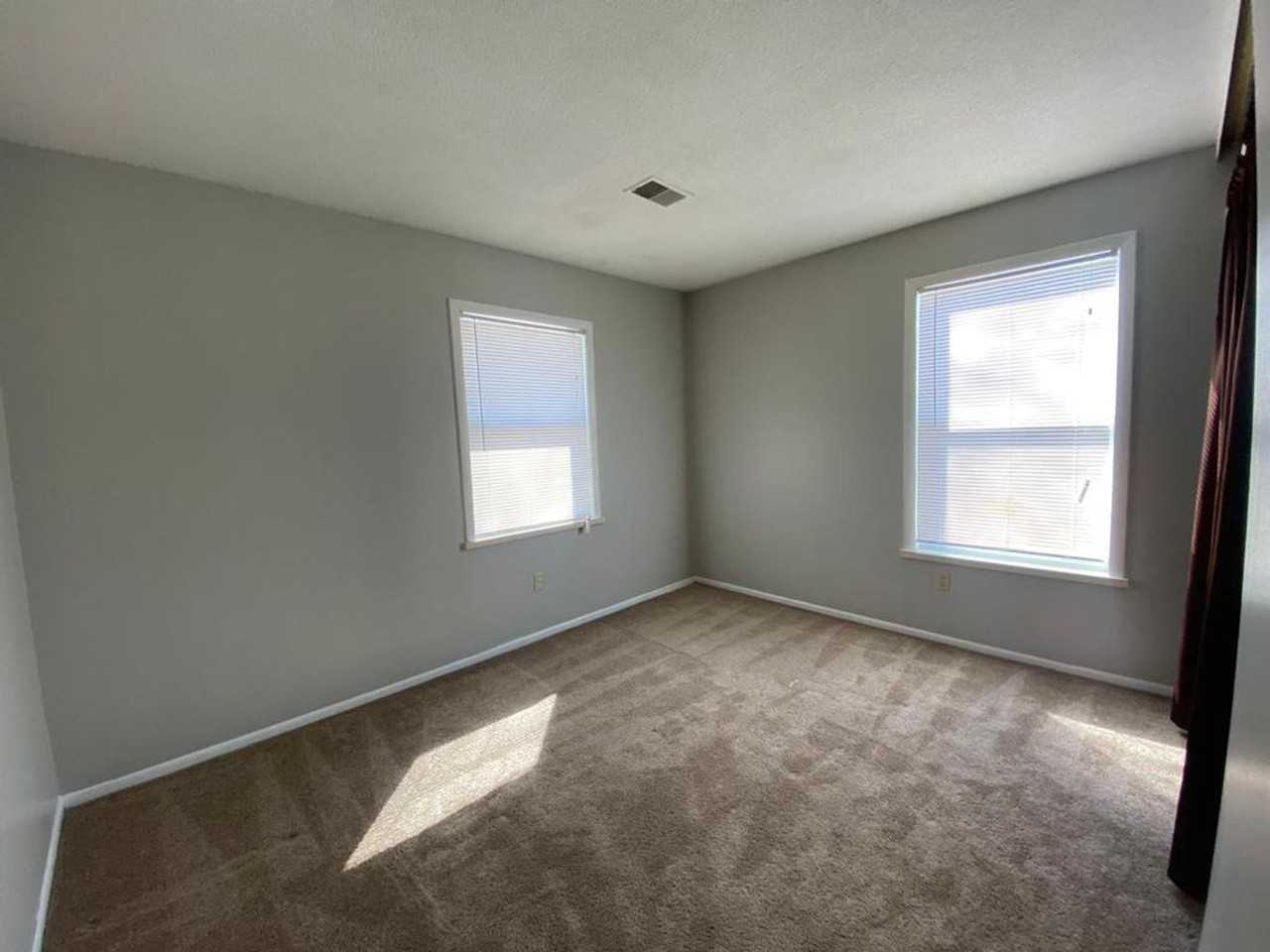 Independence Duplexes - Photo 7 of 20