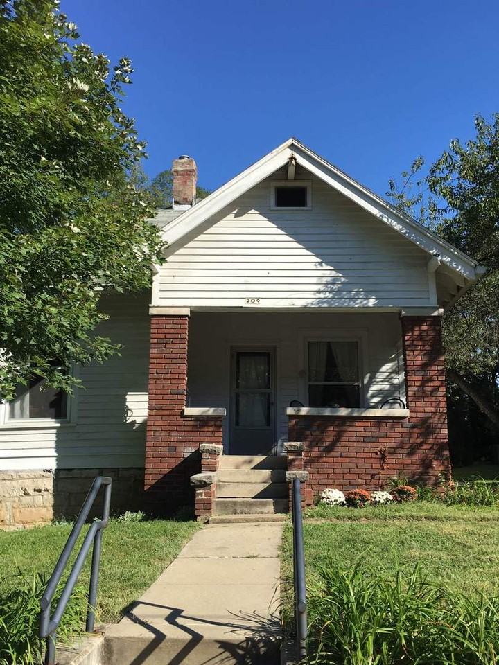 209 E 2nd St - Photo 2 of 15