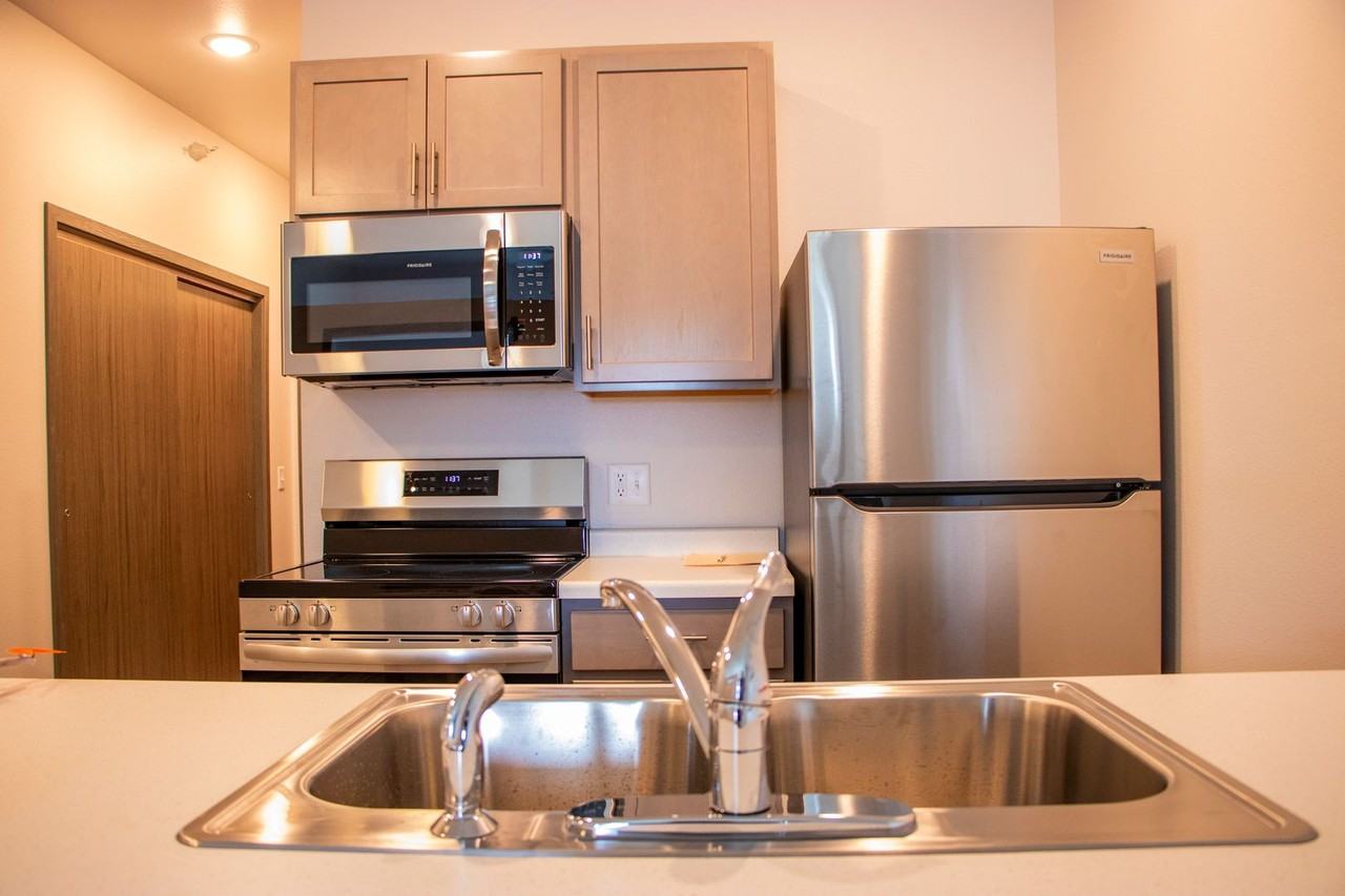 Brand New Affordable Apartments off Golf Road! - Photo 3 of 11