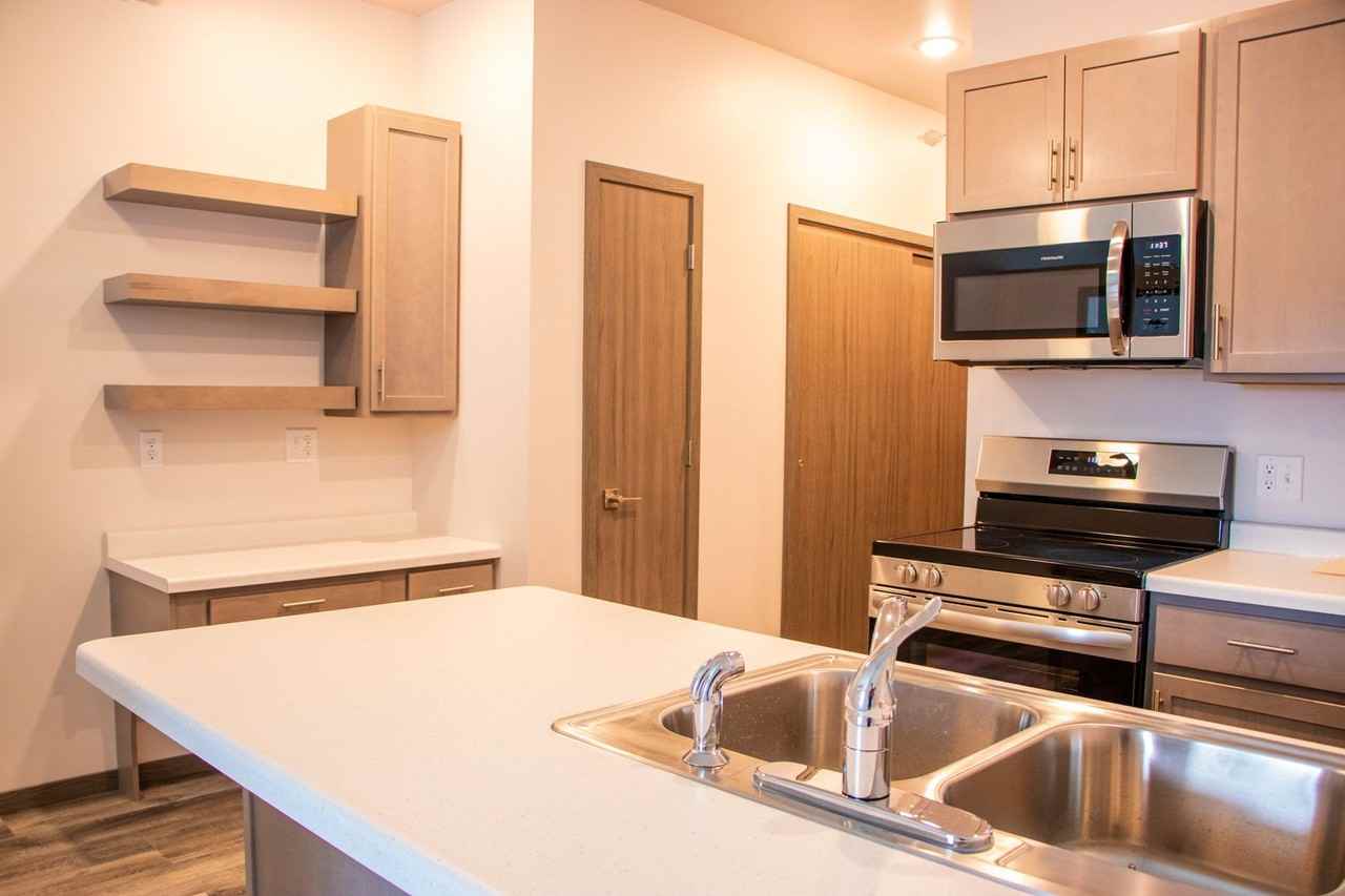 Brand New Affordable Apartments off Golf Road! - Photo 5 of 11