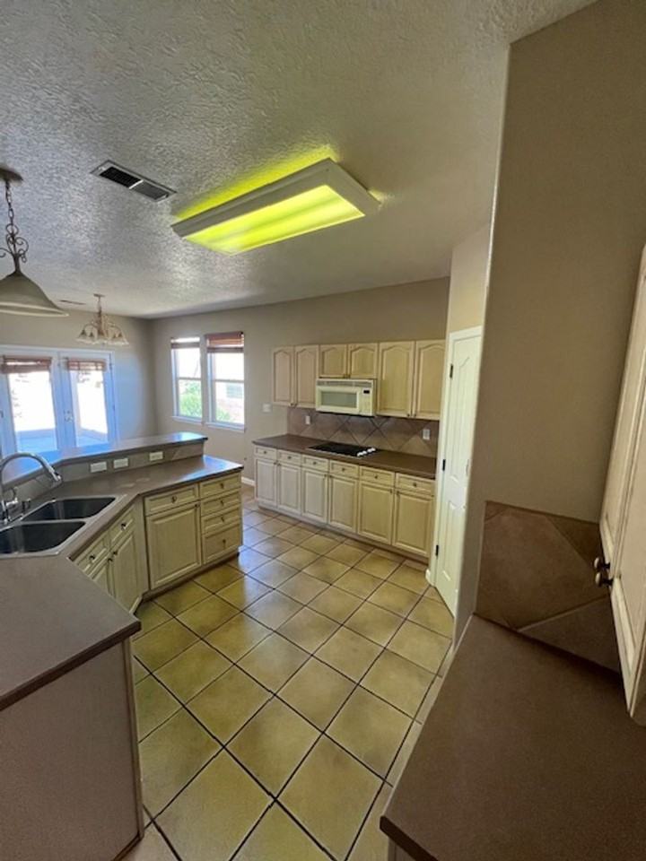 10709 Flagstone Pl Nw - Photo 3 of 17
