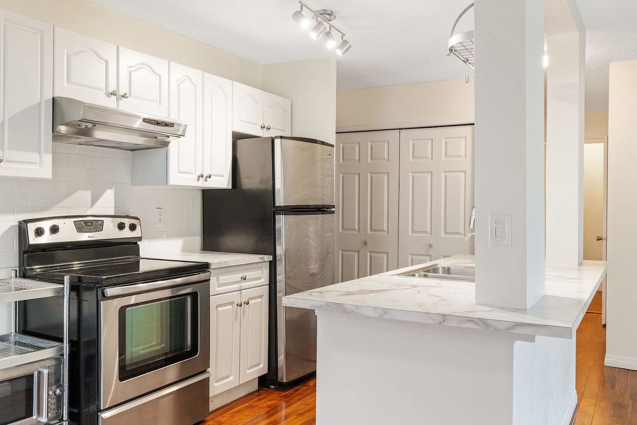 709 201-709 3 Ave Nw - Photo 2 of 24