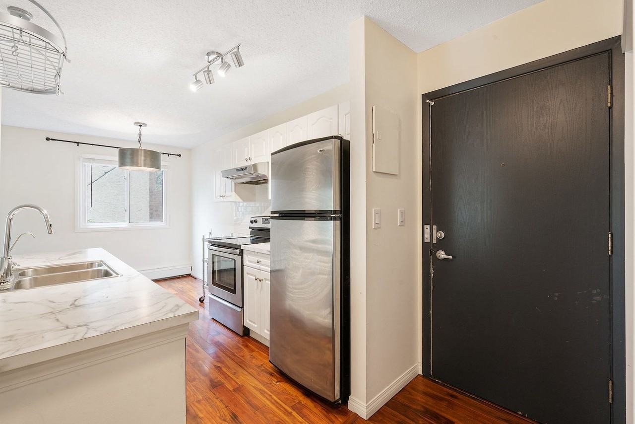 709 201-709 3 Ave Nw - Photo 3 of 24