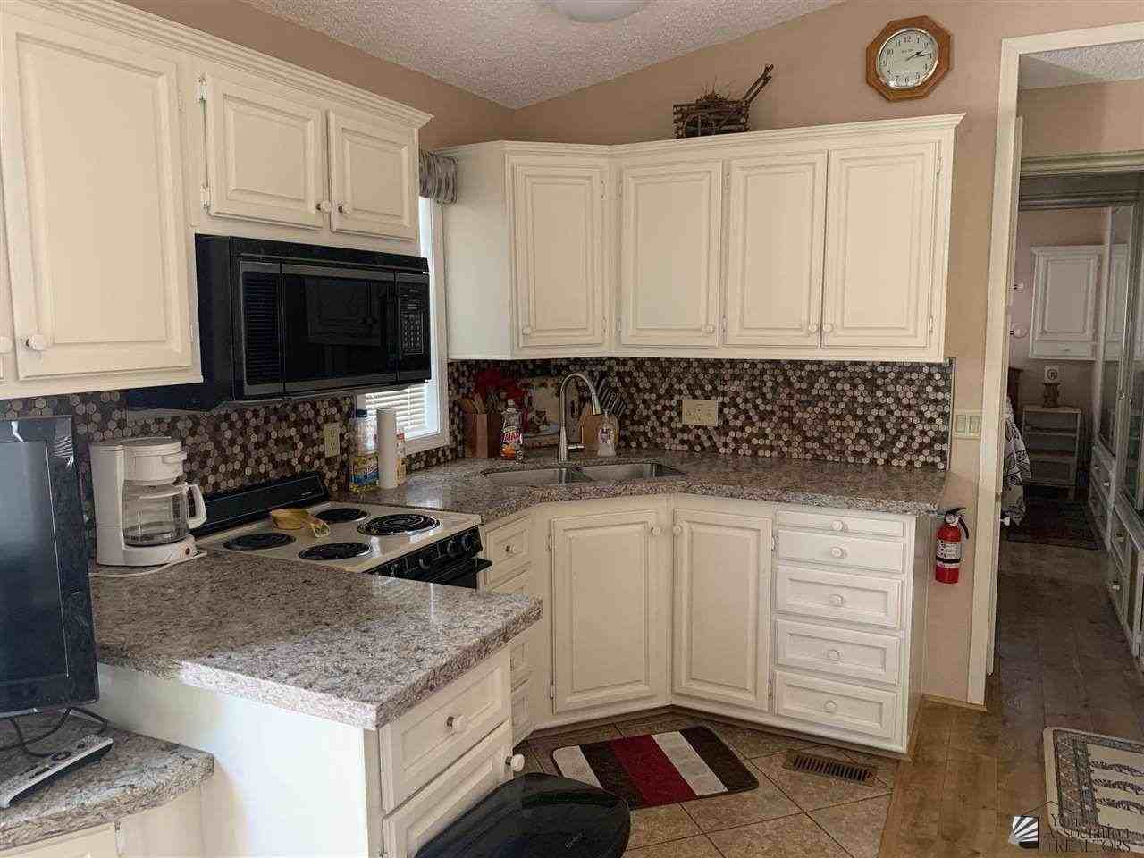 13698 East 50th Street #1 - Photo 3 of 11