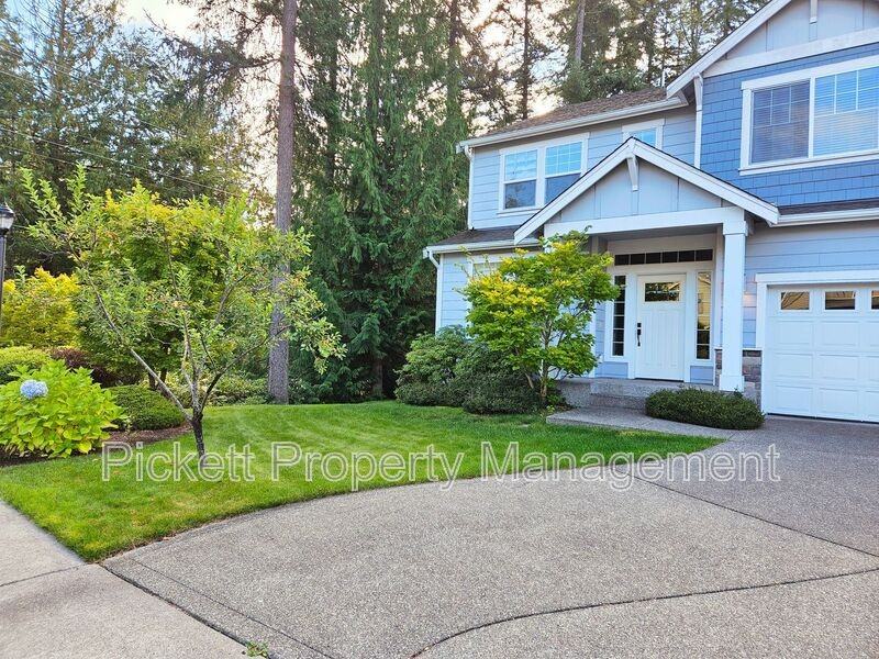2614 Ne Noll Valley Loop - Photo 2 of 28