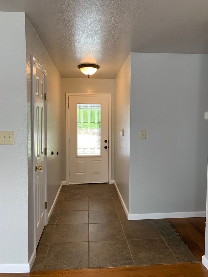 12013 N 194th East Ave - Photo 2 of 29