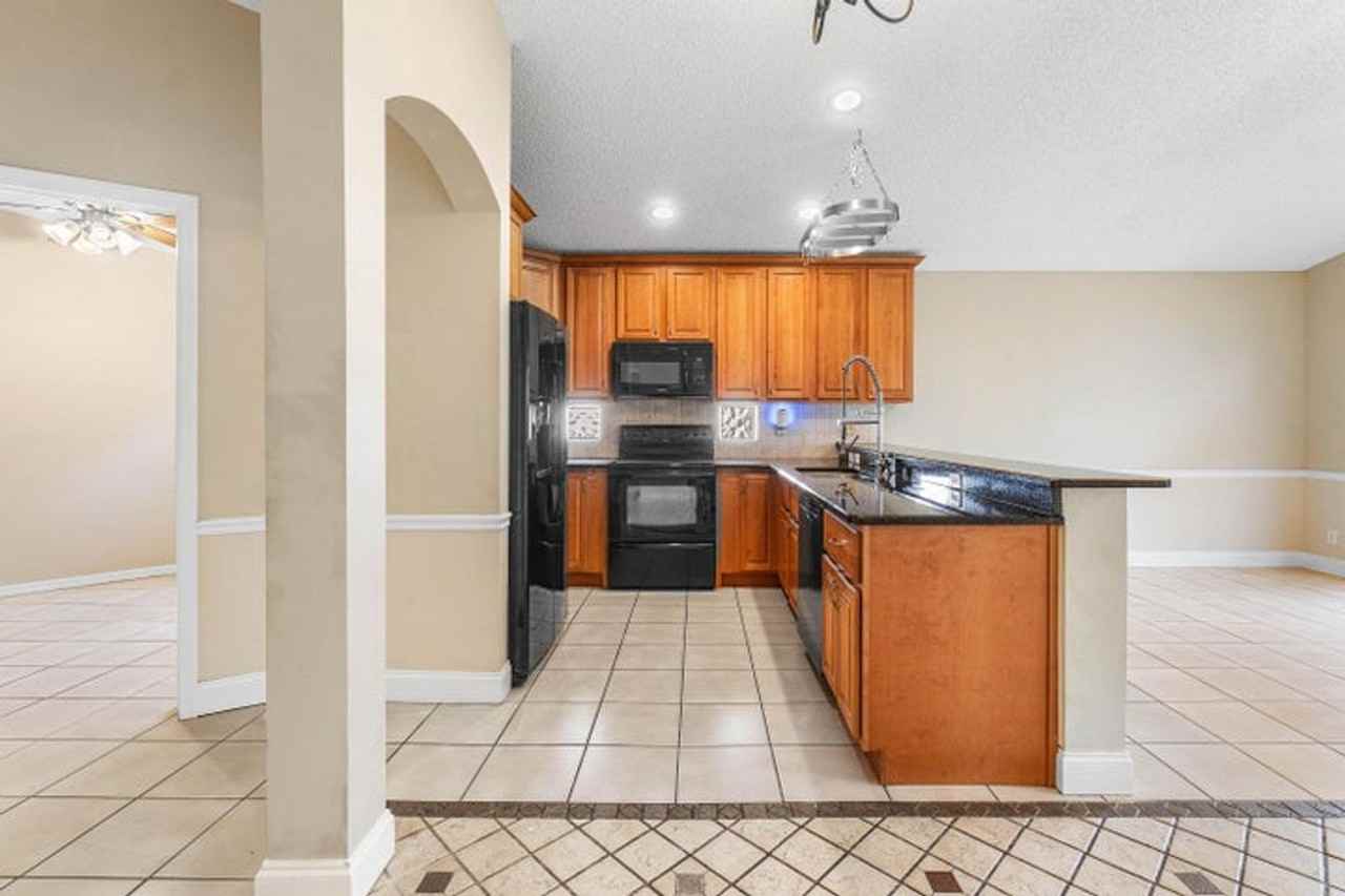 6597 Geneva St - Photo 2 of 23