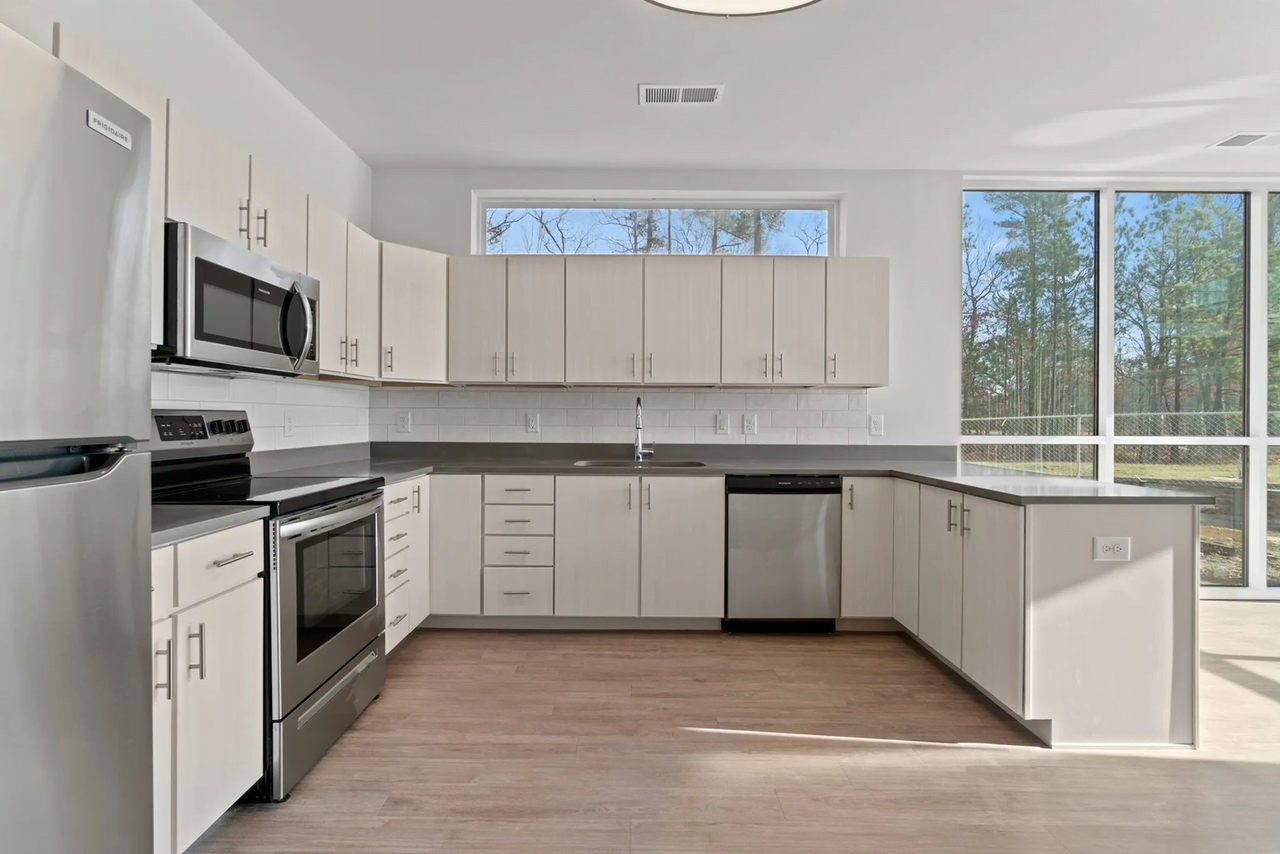 Metropolis Apartments - Photo 2 of 50