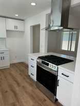 Downstairs 2 Bed 1 Bath Bungalow, 1 Parking Space Included! - Photo 1 of 1