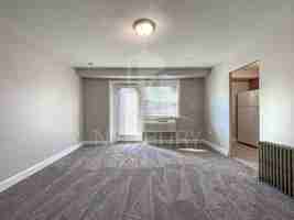 featured image of 102 W Steuben St