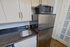 E 13th St #1A - Photo 1 of 1