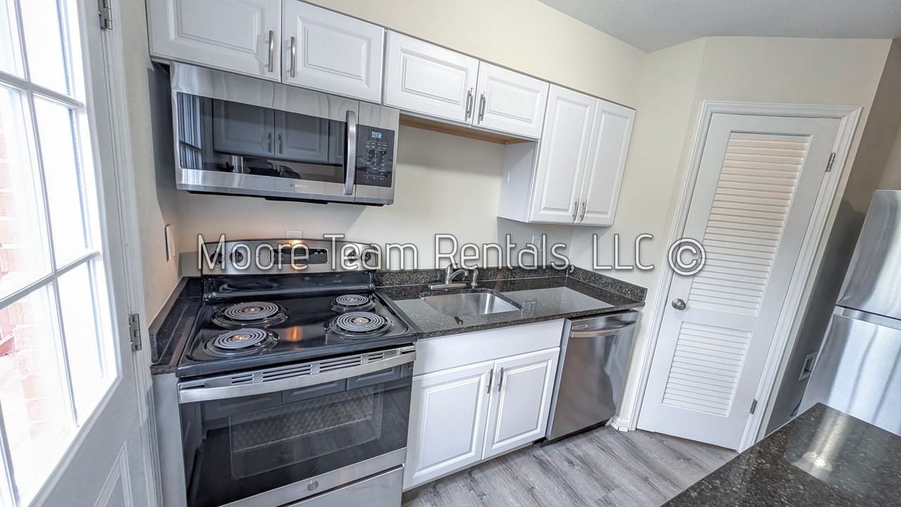 6th Ave W 420 - Photo 3 of 14