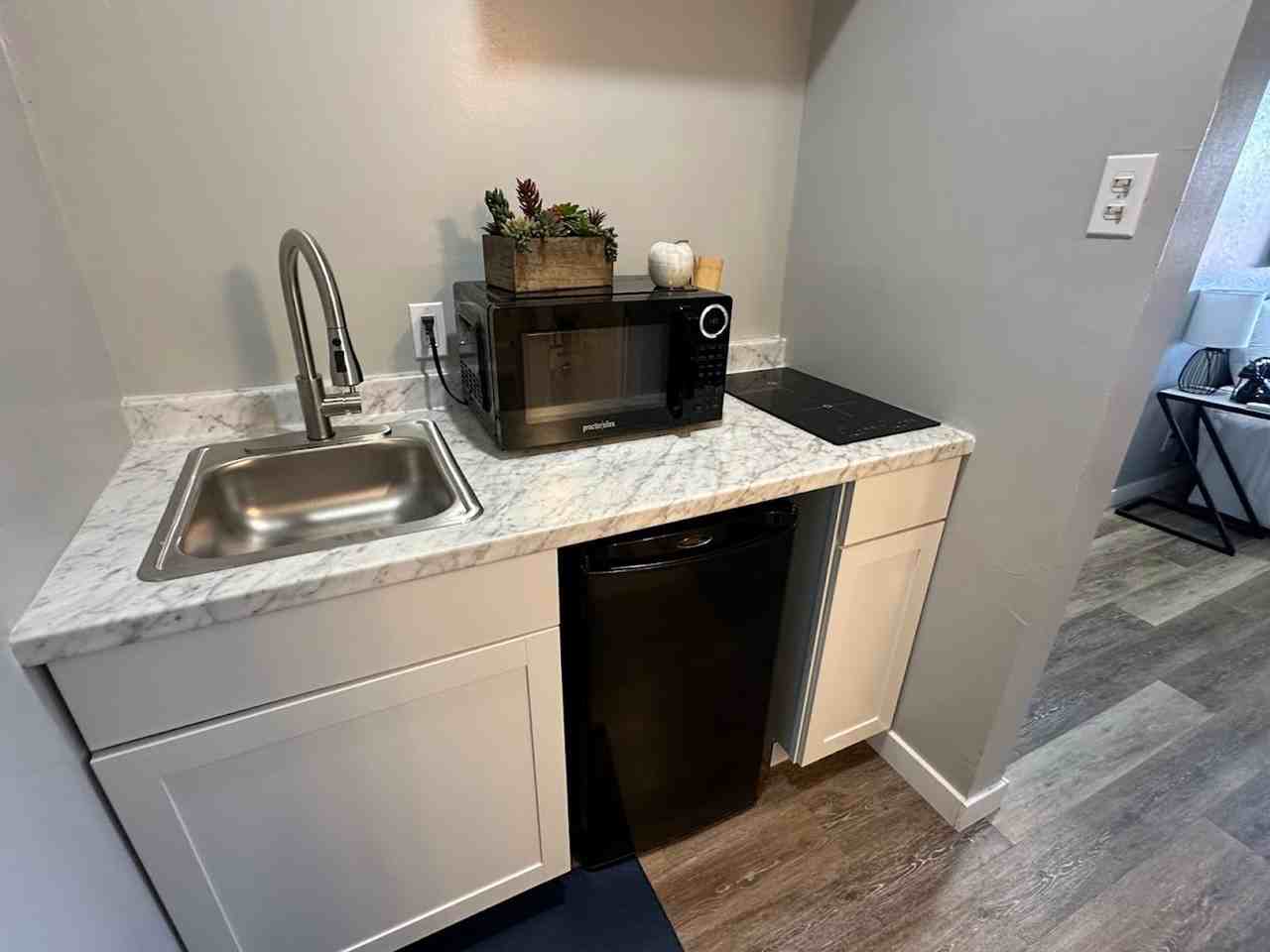 Clean, updated unit with utilities included - Photo 3 of 24