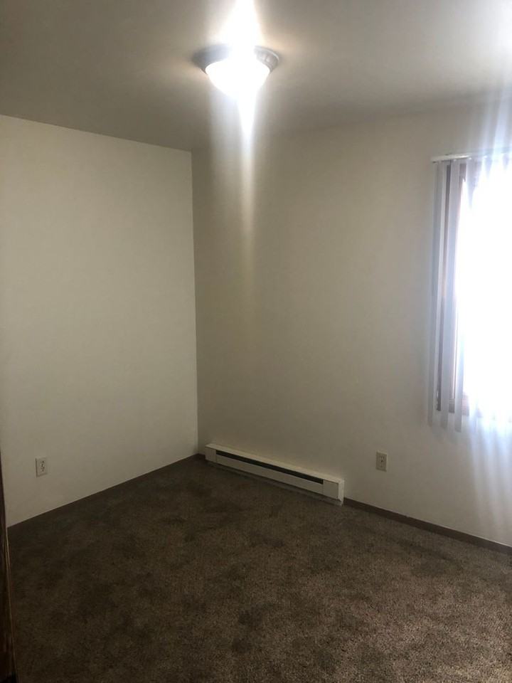 Village Apartments - Photo 3 of 11