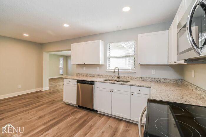 7010 Bernay Ave - Photo 3 of 17